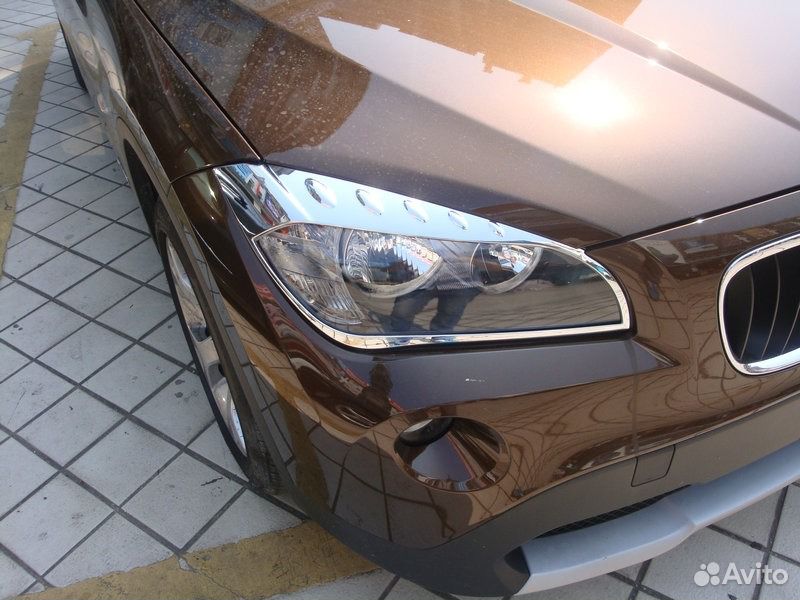 Хромированные накладки на передние фары BMW X1 (20
