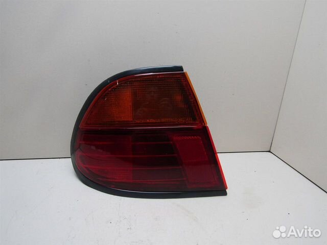 Фонарь задний наружный левый Nissan Almera N15 19