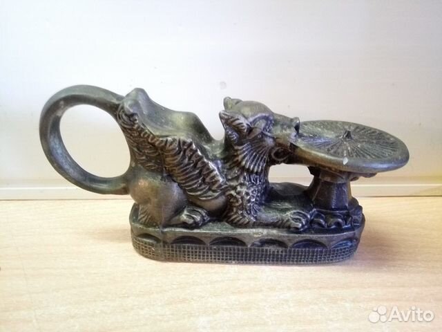 Подсвечник лев