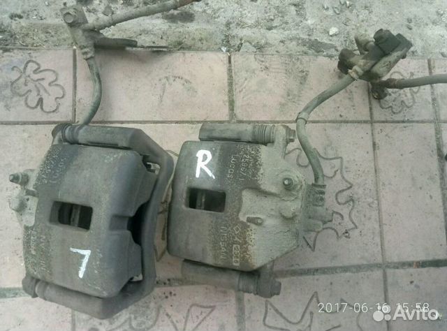 Супорт тормозной передний Ниссан примьера р12