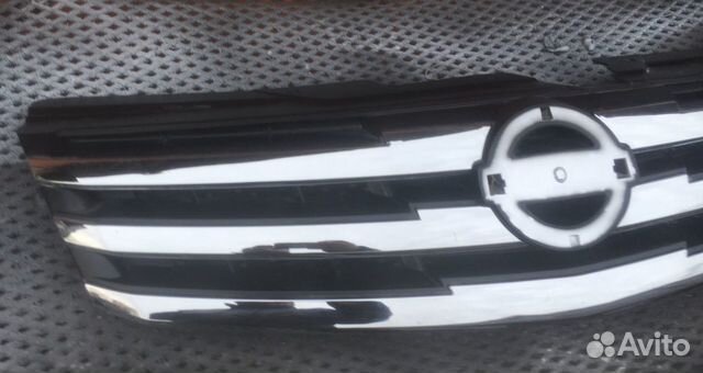 Решетка радиатора на Nissan Almera 12-18