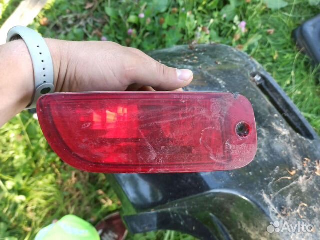 Левый противотуманный фонарь заднего бампера Chevr