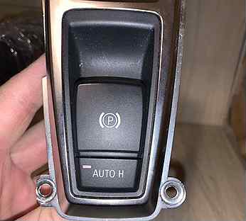 Ручник х5 е70. Кнопка ручной тормоз BMW е71. Кнопка ручной тормоз е71. Моторчик блока ручника БМВ х5 е70. Накладки на кнопки х5 е70.