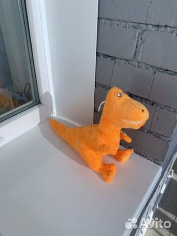 Динозавр плюшевый