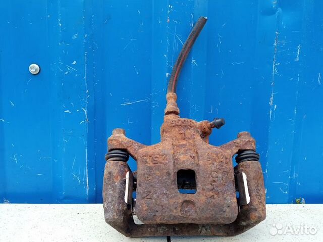 Суппорт задний левый Mitsubishi Galant 8 2.0 4G63