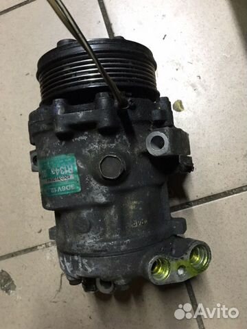 Компрессор кондиционера на Opel Astra