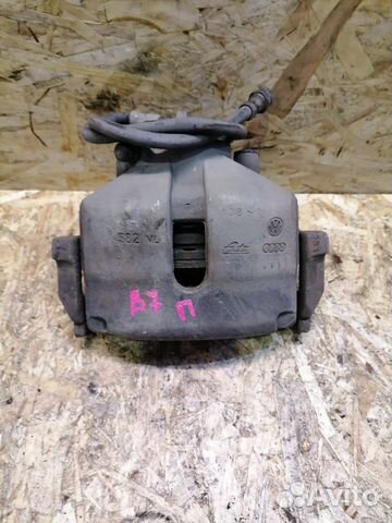 Суппорт передний правый Volkswagen Passat B7