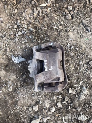 Суппорт передний левый Chevrolet Cruze 1.6