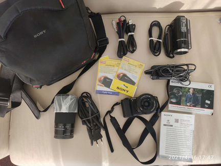 Sony: видеокамера + фотоаппарат + объектив + сумка