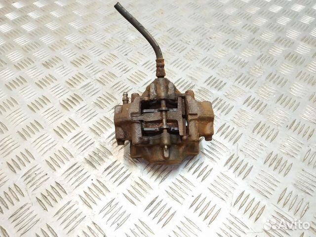 Суппорт тормозной задний левый Mercedes-Benz