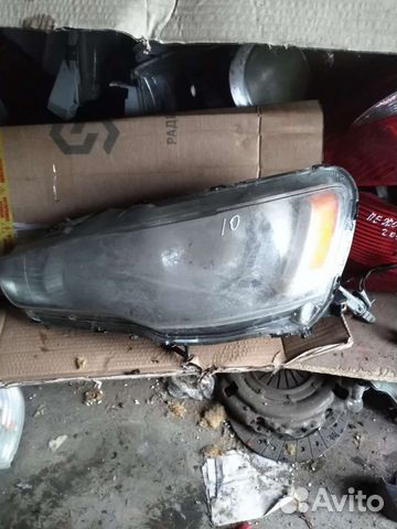 Фара левая Mitsubishi Lancer 10