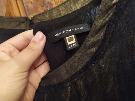 Платье от бренда 