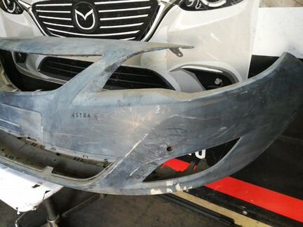 Бампер передний Opel Astra J